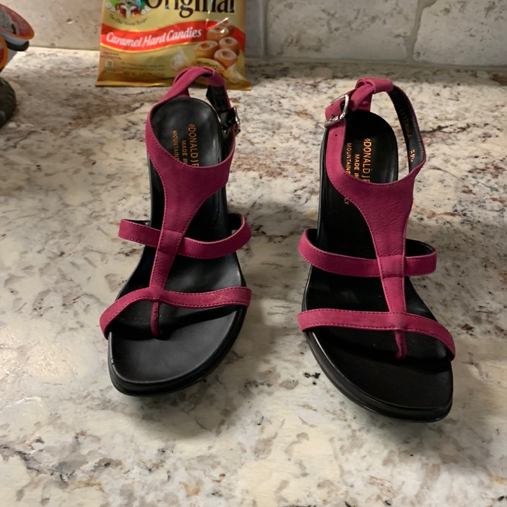 Beautiful Donald Pliner Sandals in a Dark Pink/Plum color in a size 5.5.